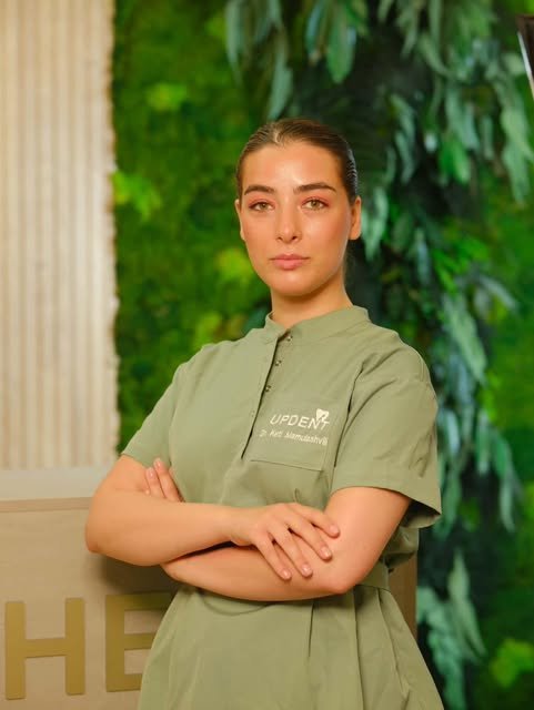 Dr Ketevan Mamulashvili, prosthodontist, in clinic uniform at the Updent clinic in Tbilisi